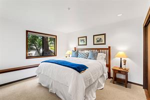 Bedroom 2 has a California King Bed and a BuiltIn Desk