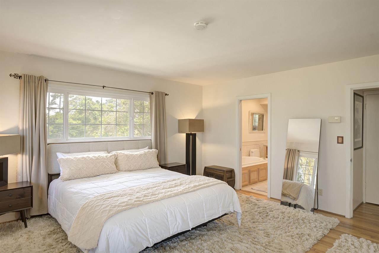 Bedroom 1  En Suite Bathroom with Shower and Separate Tub
