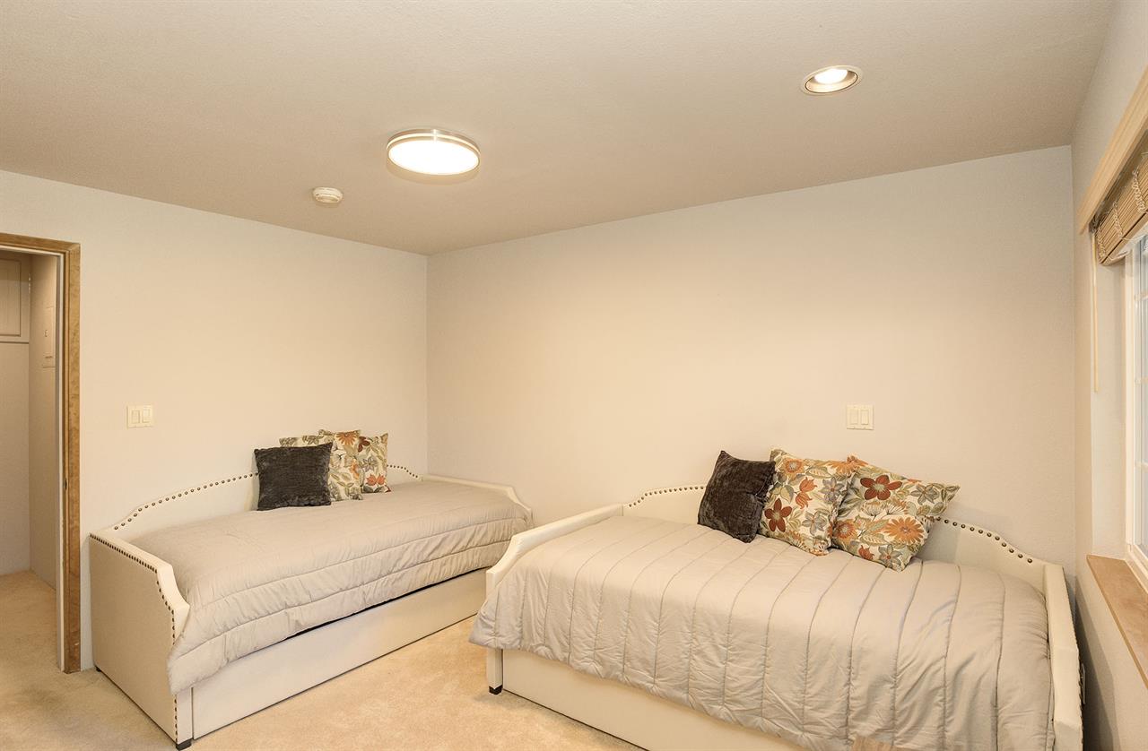 Bedroom 2  Two Twin Day Beds and a Small Desk and Chair