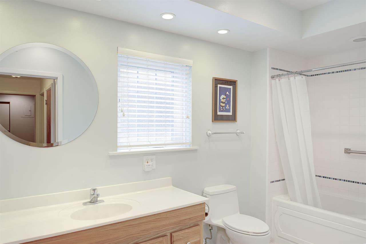 Bathroom 2  has a Shower Over a Deep Soaking Tub with Jets