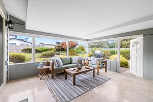 Spacious Sun Room  Family Room Opens to the Backyard