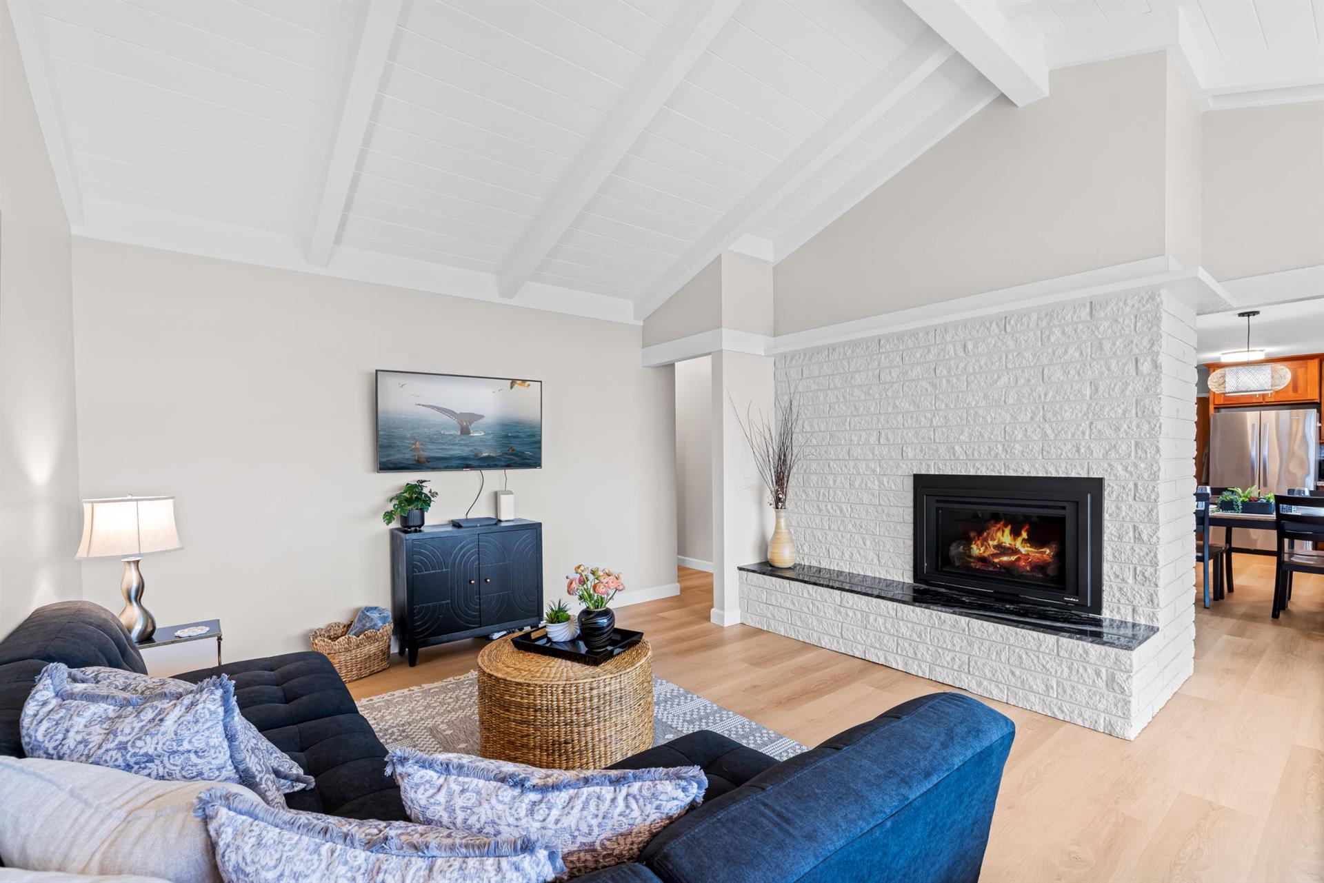 Living Room with Gas Fireplace, Smart TV and an Ocean View