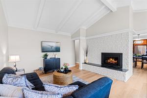Living Room with Gas Fireplace, Smart TV and an Ocean View