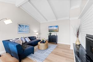 Living Room with Gas Fireplace, Smart TV and an Ocean View