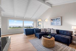 Living Room with Gas Fireplace, Smart TV and an Ocean View