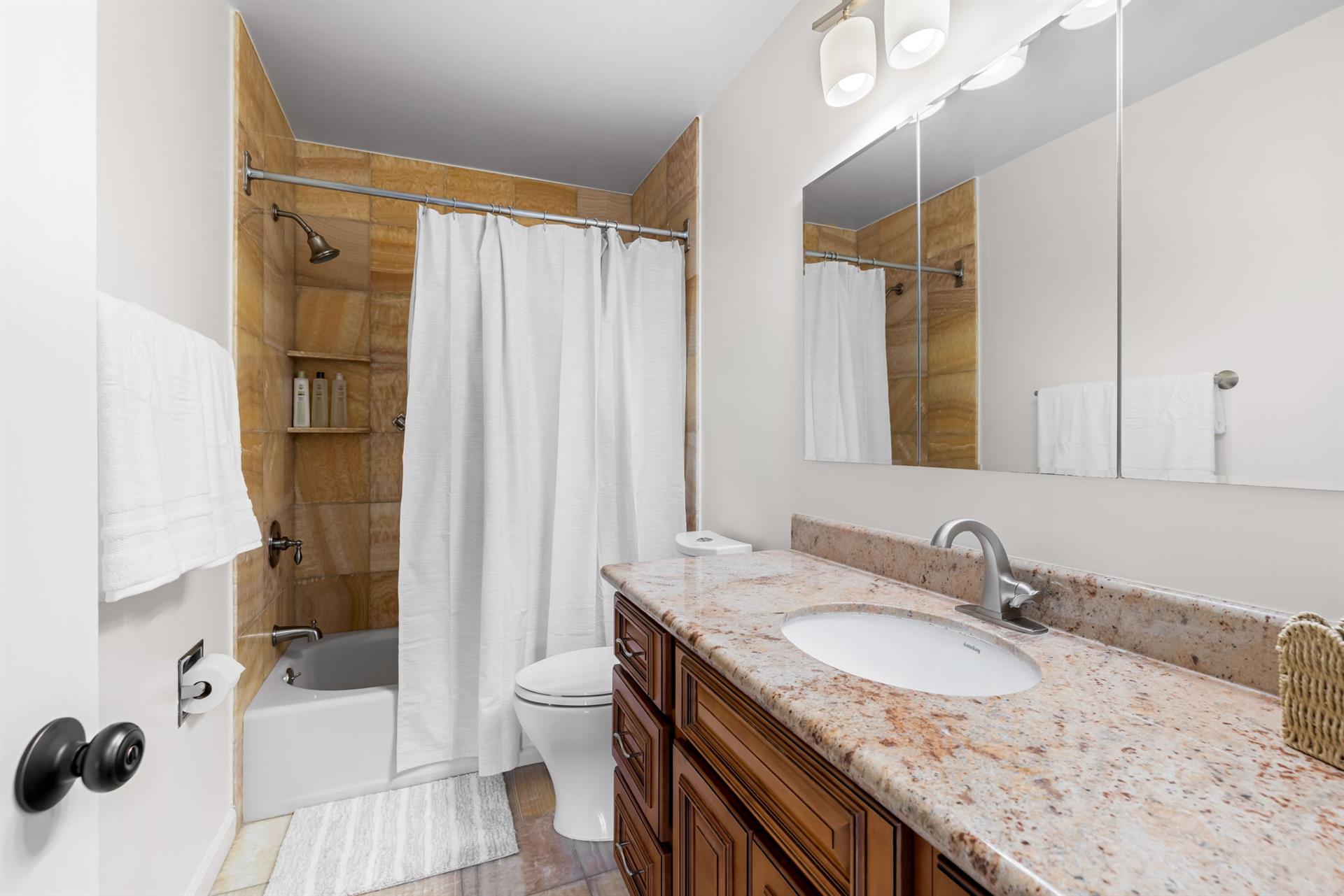 Bedroom 1  EnSuite Bath with a ShowerOverTub Combination.