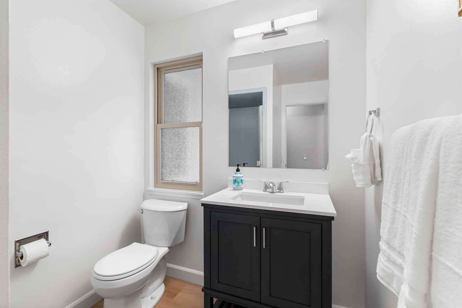 Shared Hall Bathroom has a Shower