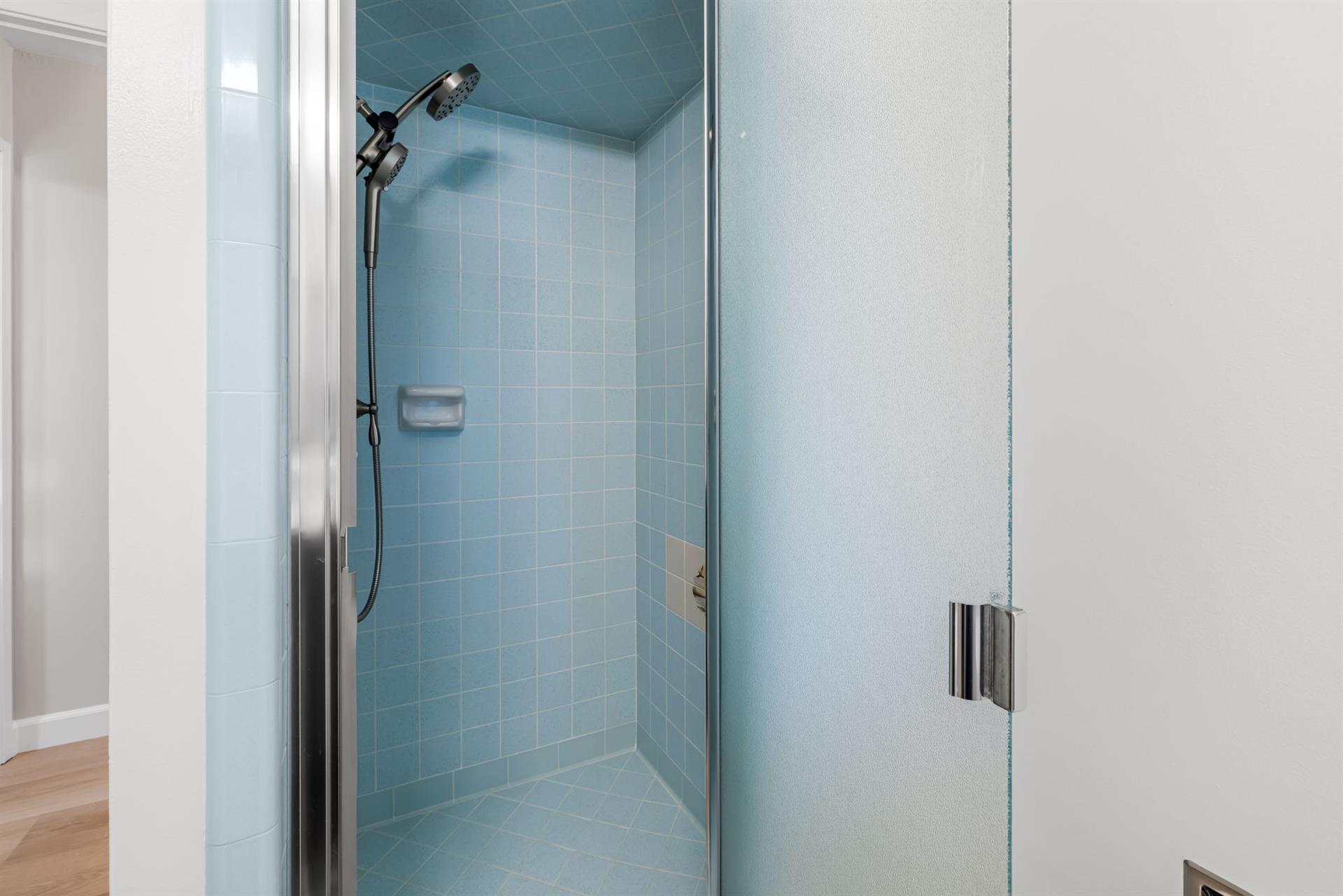 Shared Hall Bathroom has a Shower