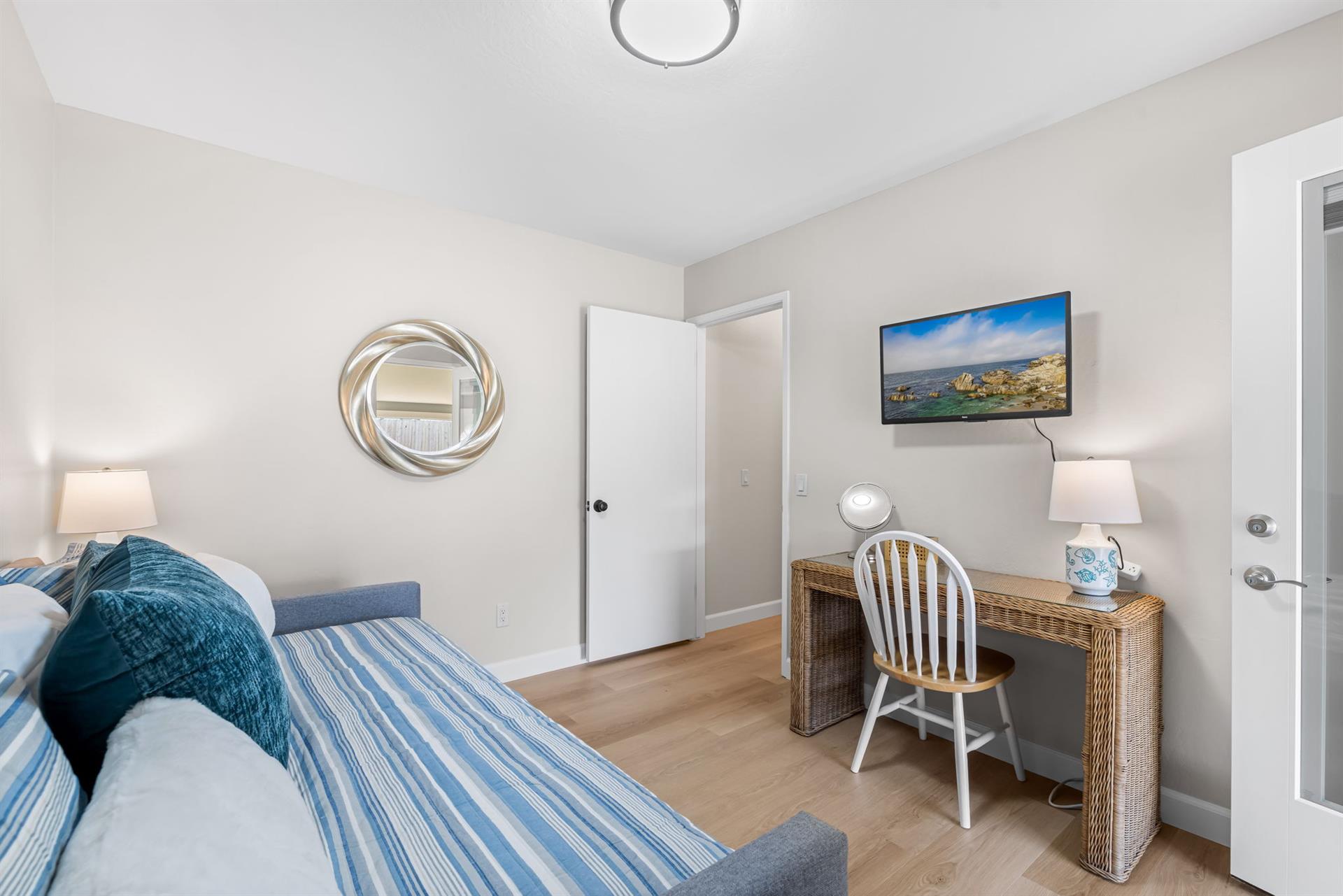 Bedroom 3 has a Twin Bed, WiFi Enabled Smart TV and a Desk