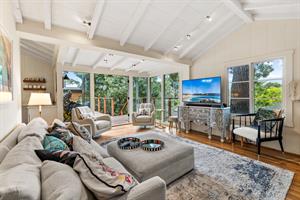 Living Room Showing the French Doors to the Balcony Open