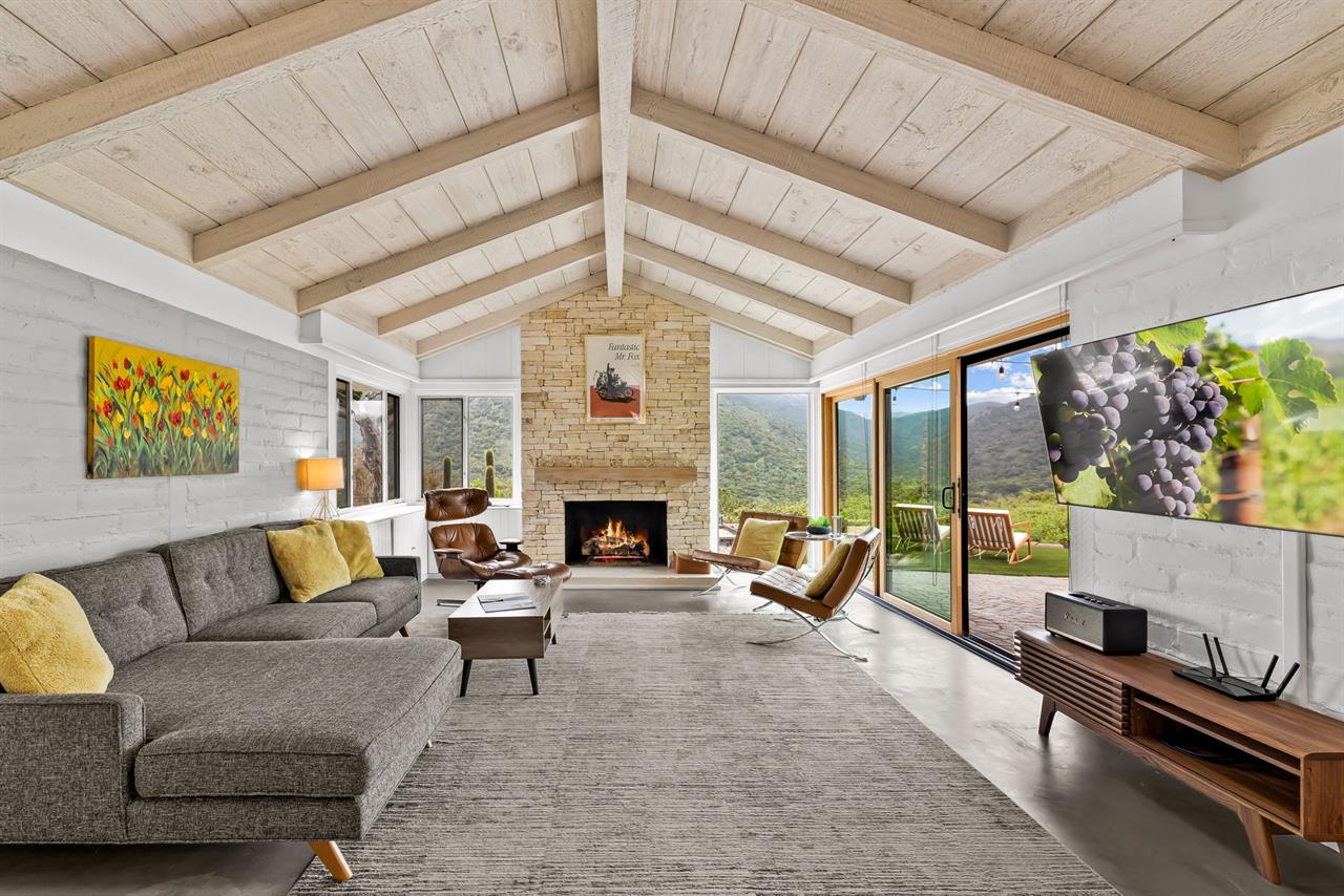 Living Room with Fireplace and TV