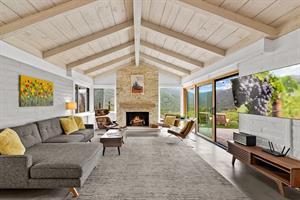 Living Room with Fireplace and TV