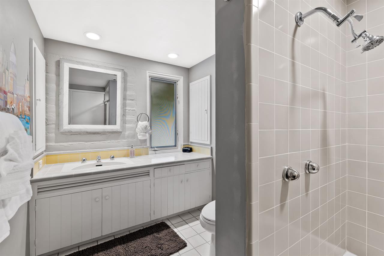 Hallway Bath has a Shower