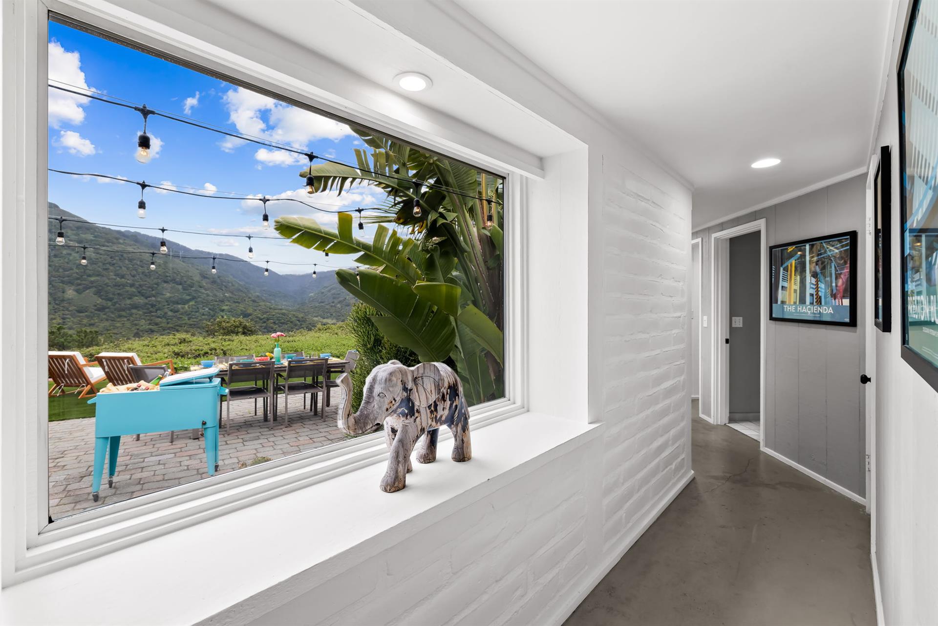 Looking Out to the Lighted Backyard Dining Area