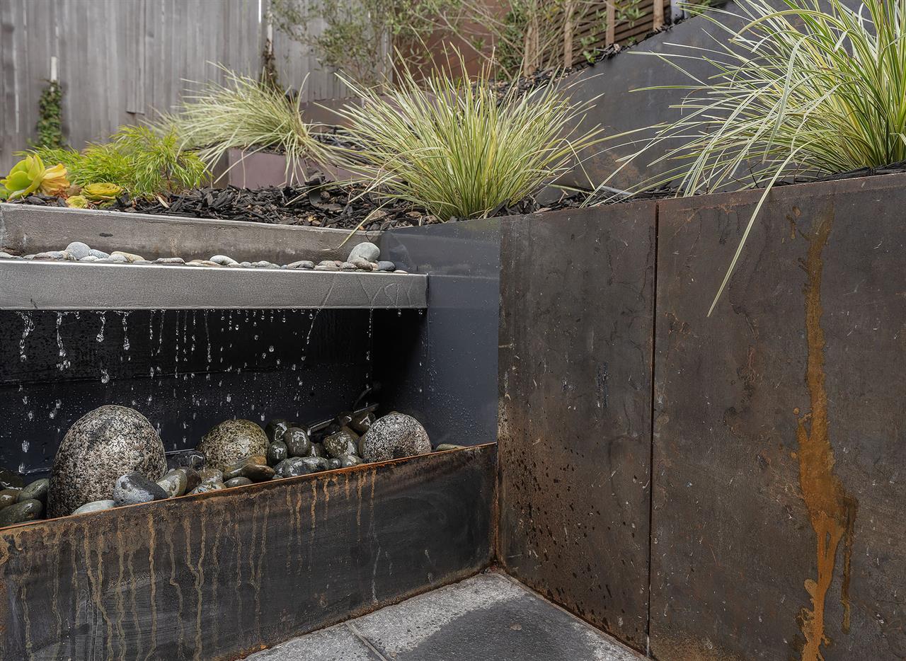Peaceful Water Feature in Front Courtyard