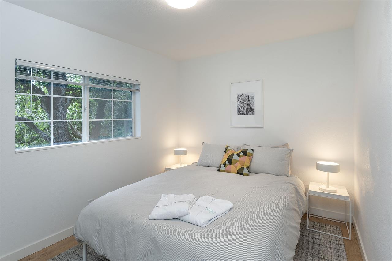 Guest Suite Bedroom has a Queen Bed