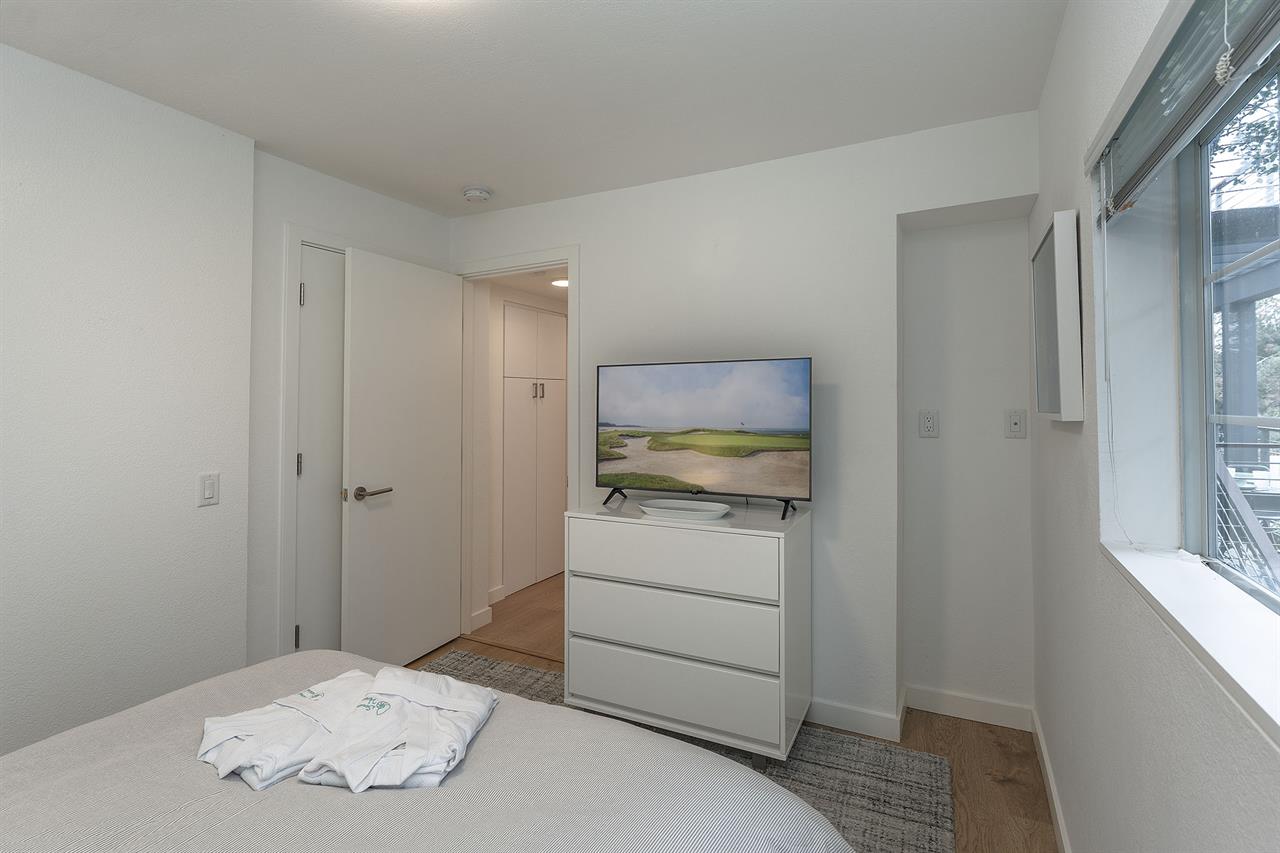 Bedroom has a Queen Bed and a TV