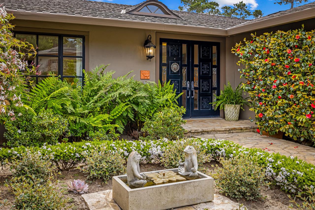 Front Entry to the Home has a Charming Fountain