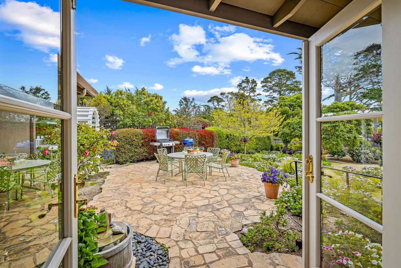 Outside the Family Room is the Patio with Dining and BBQ Area
