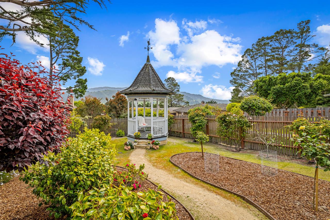 Backyard has a Charming Gazebo