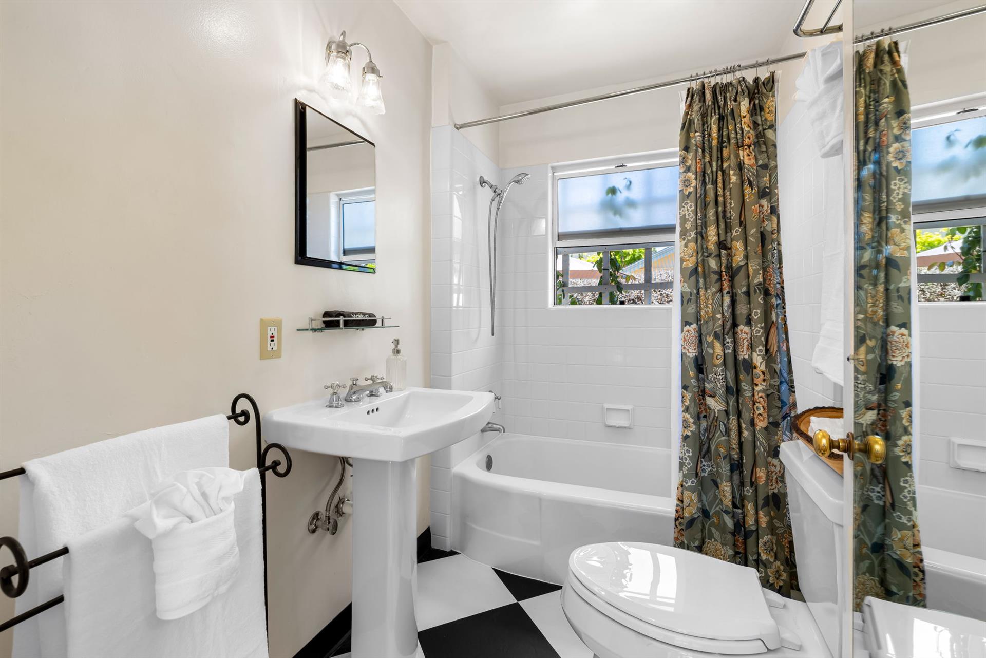 EnSuite Bath for Bedroom 1 has a ShowerOverTub