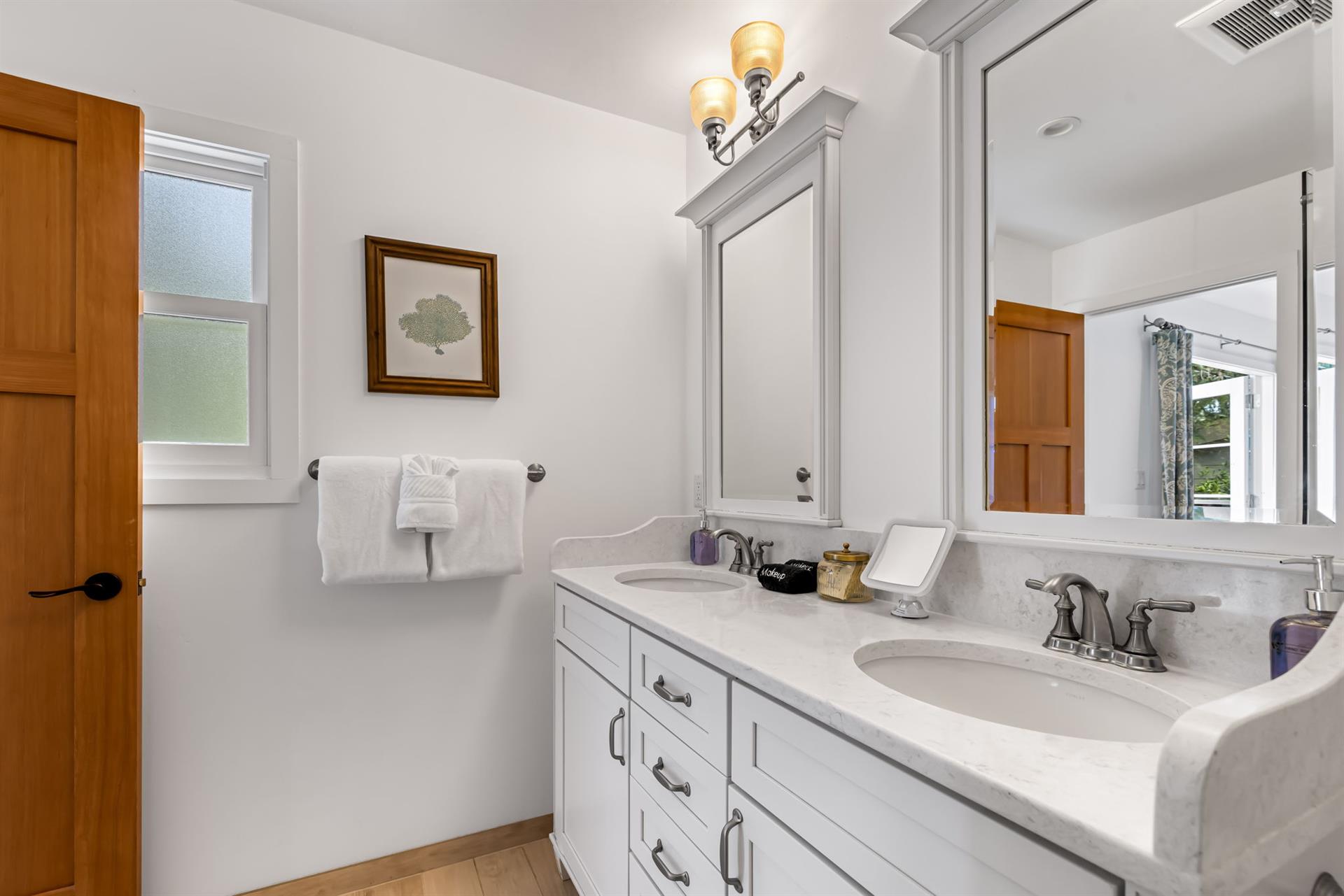 EnSuite Bath for Bedroom 1 has a Shower and Double Vanity