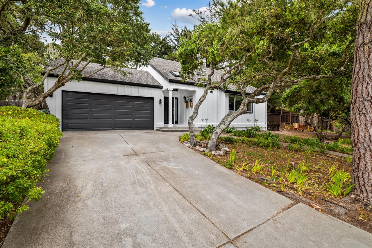 Parking for 12 Cars in the Garage Plus 2 in the Driveway