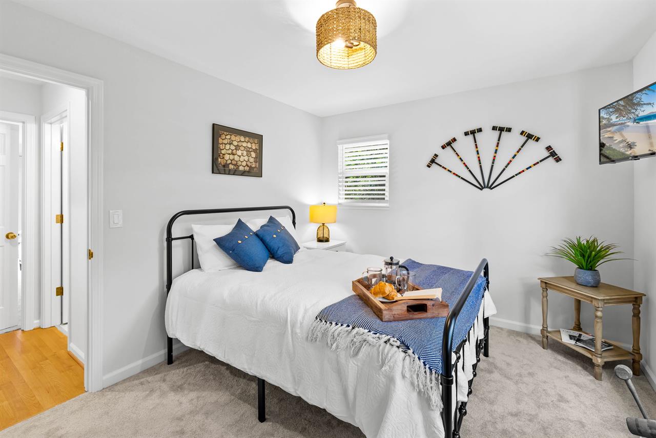 Bedroom 2  Upstairs. Queen Bed, TV