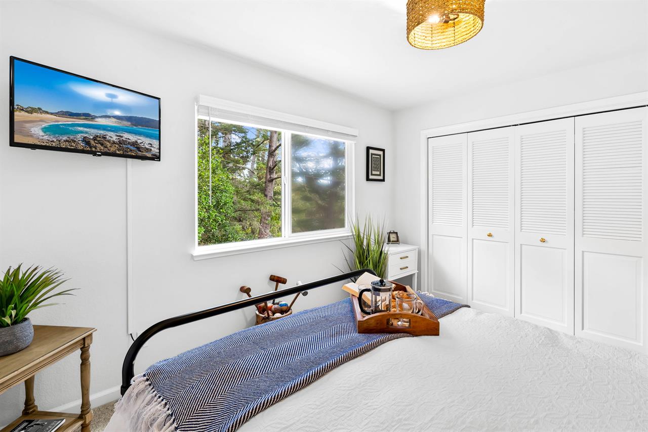 Bedroom 2  Upstairs. Queen Bed, TV