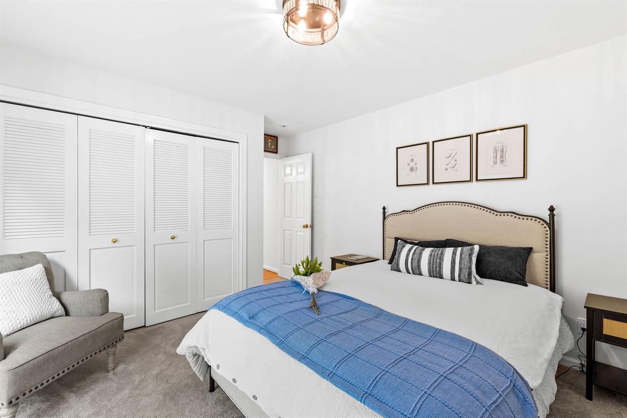 Downstairs Bedroom 3 has a Queen Bed