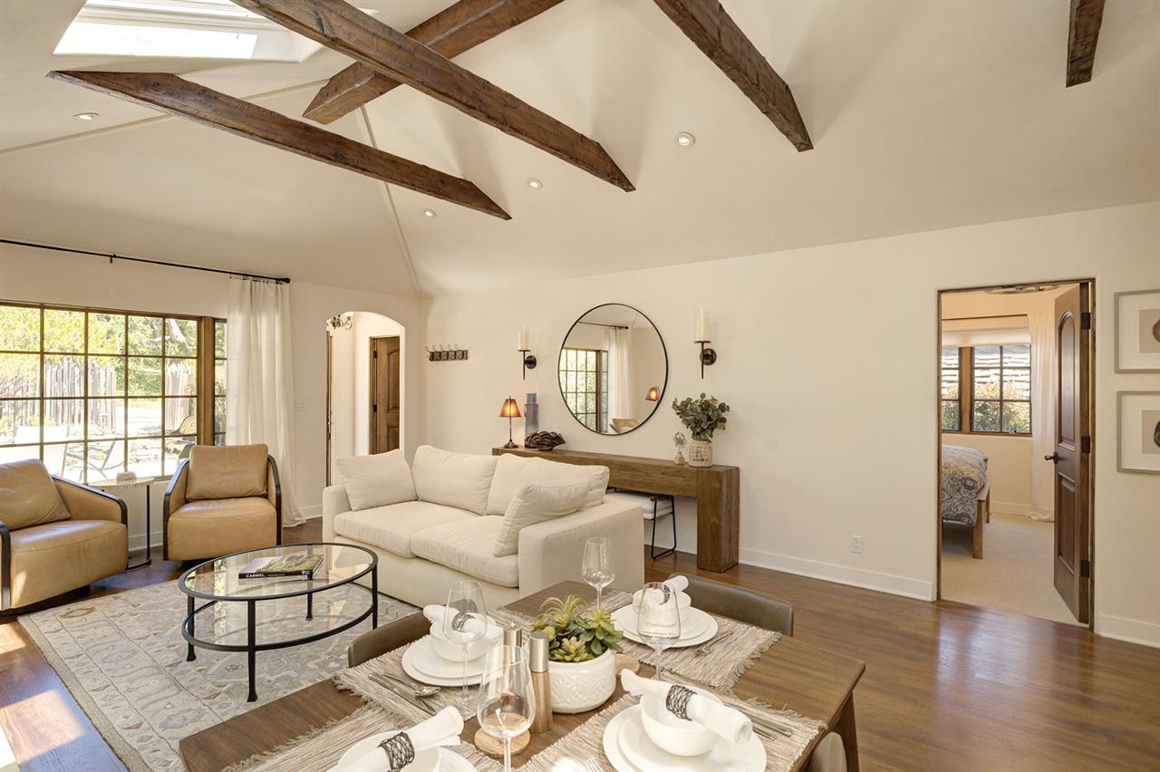 Great Room with Open Beamed Vaulted Ceilings and Skylights