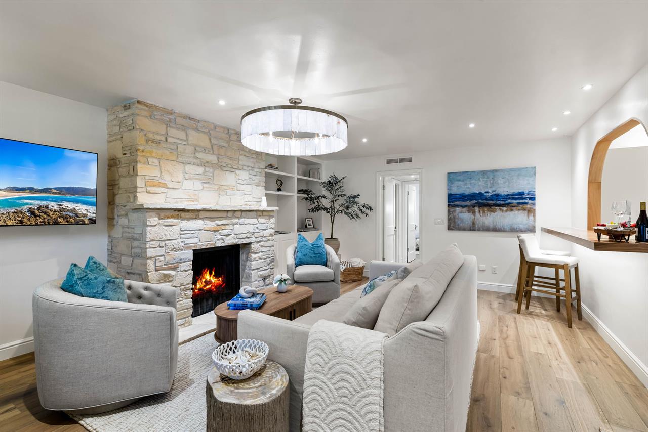 Living Room with a Gas Fireplace and WiFiConnected Smart TV