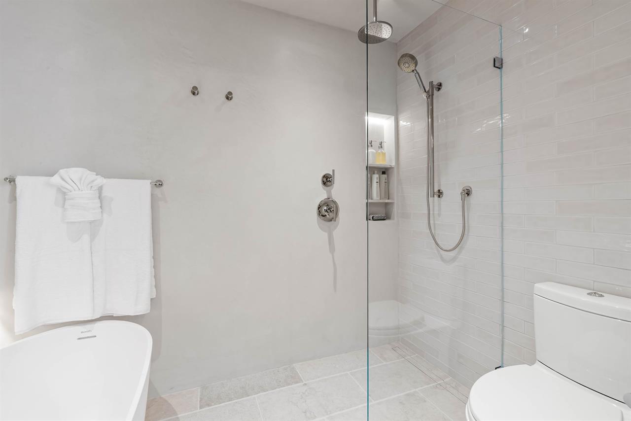 EnSuite Bath for Bedroom 1 has a Shower and Separate Tub