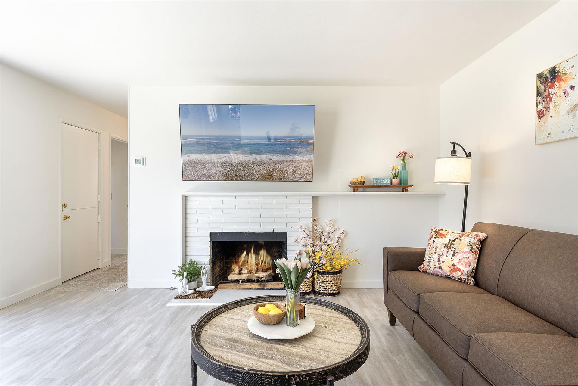 Living Room has a Gas Fireplace and TV