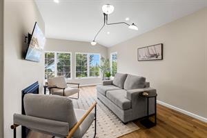 Living Room with Gas Fireplace and WiFienabled Smart TV