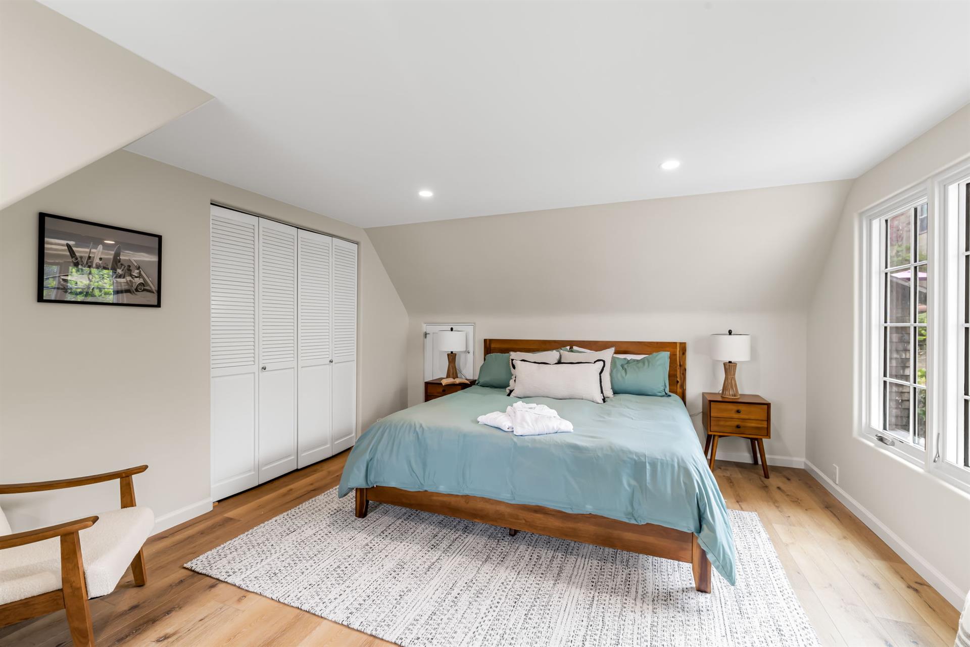 Bedroom 1 has a King Bed and EnSuite Bath with a Shower