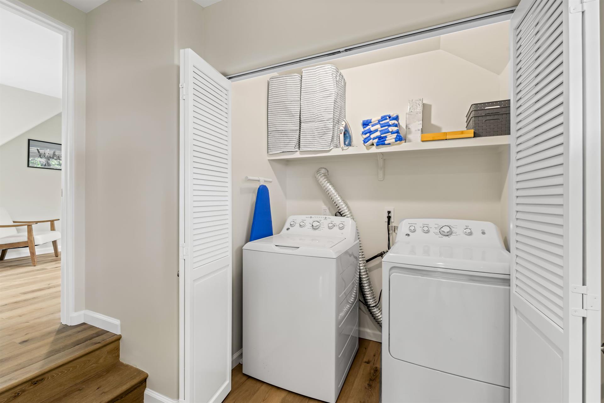 Washer and Dryer at the Top of the Stairs