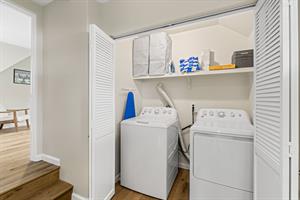 Washer and Dryer at the Top of the Stairs