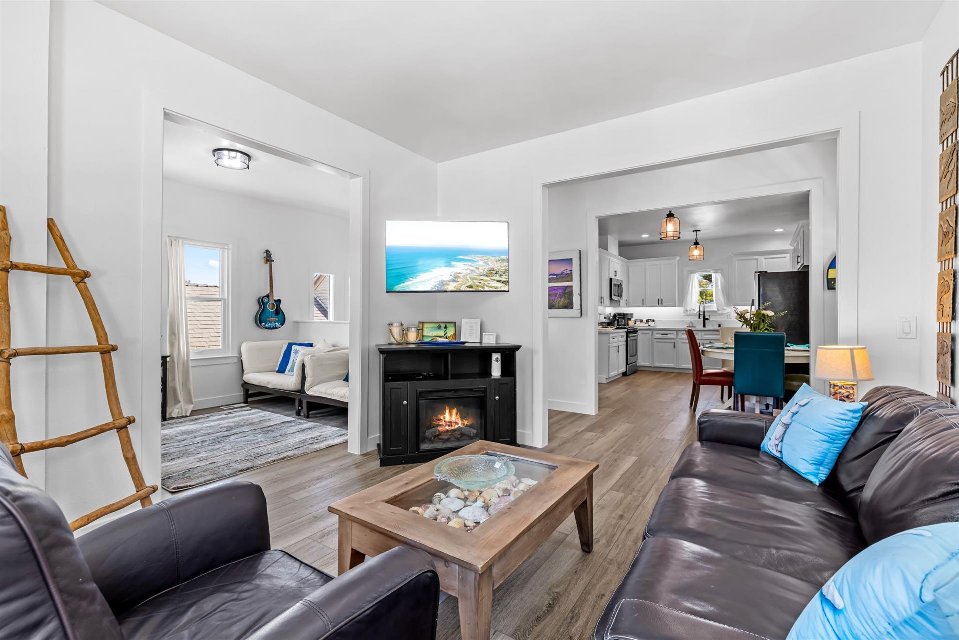 Living Room has a 48 TV, Fireplace and a Queen Sofa Bed