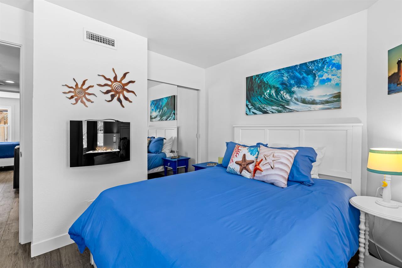 Bedroom 2  Has a Queen Bed. TV and Electric Fireplace