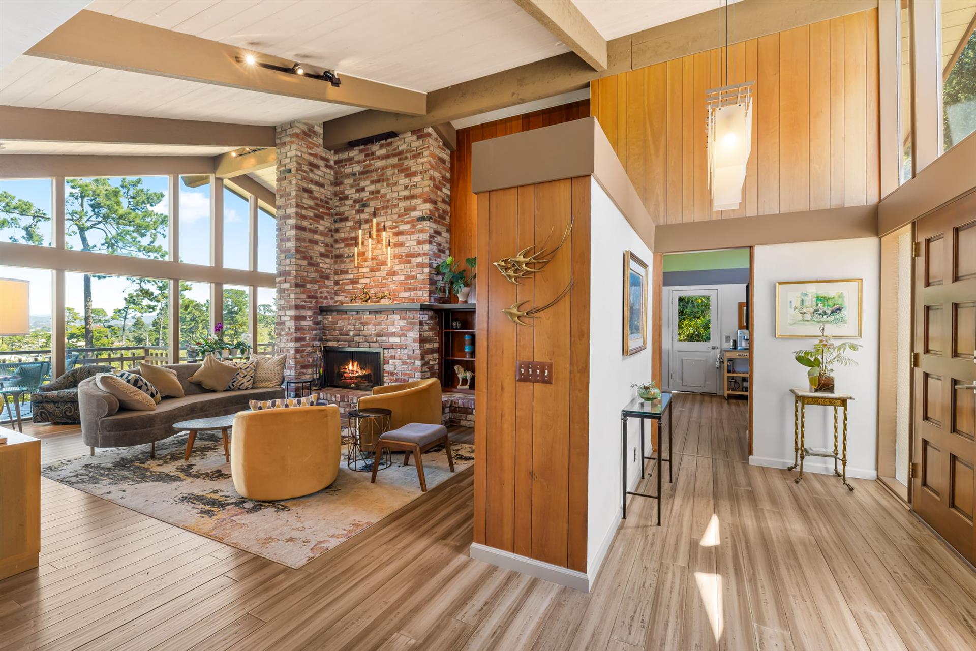 Living Room has a WoodBurning Fireplace and TV