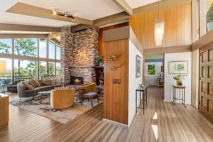 Living Room has a WoodBurning Fireplace and TV