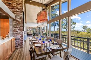 Dinning Area Next to the Kitchen has Distant Bay Views