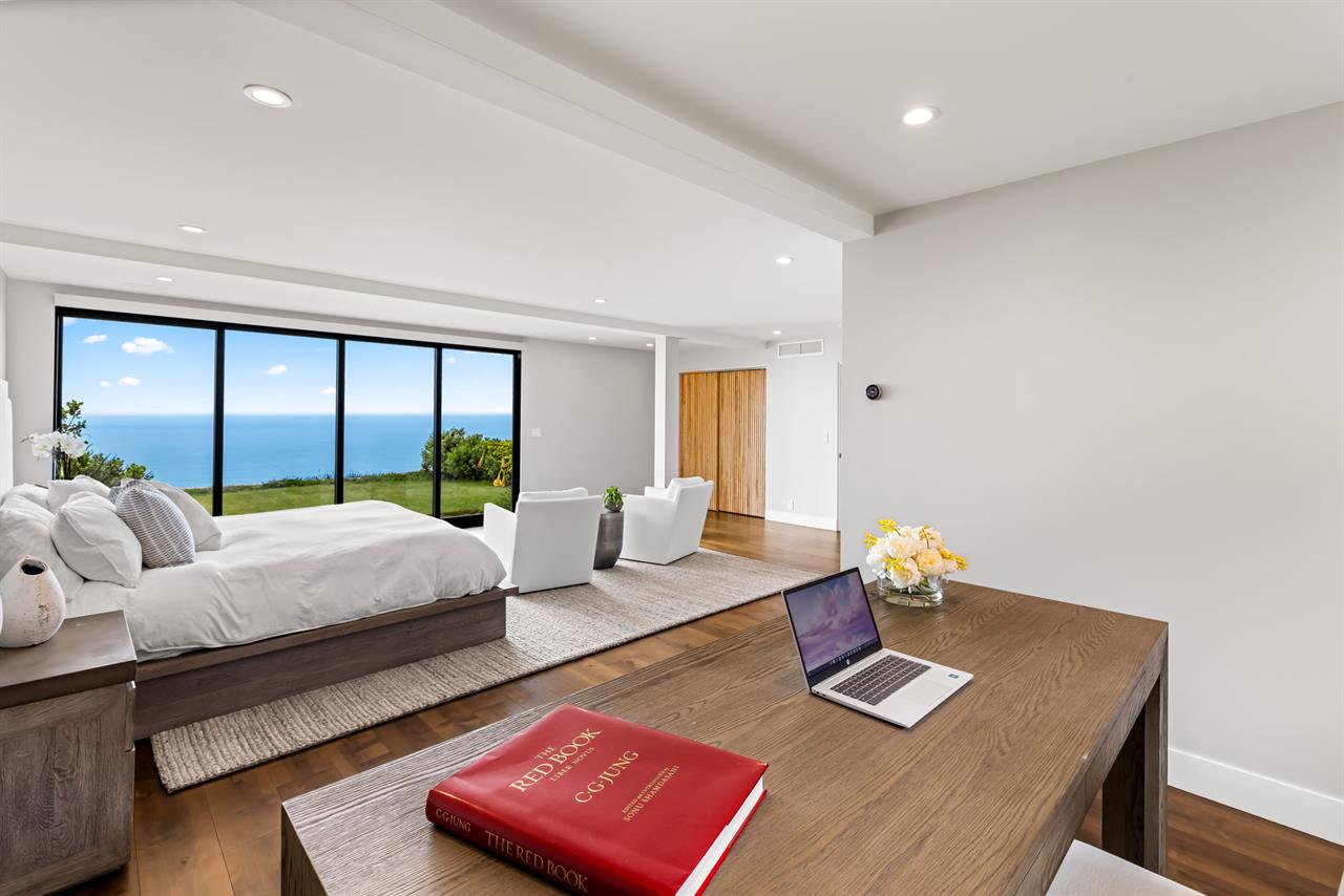 Upstairs Bedroom 1  has a Workspace with an Ocean view
