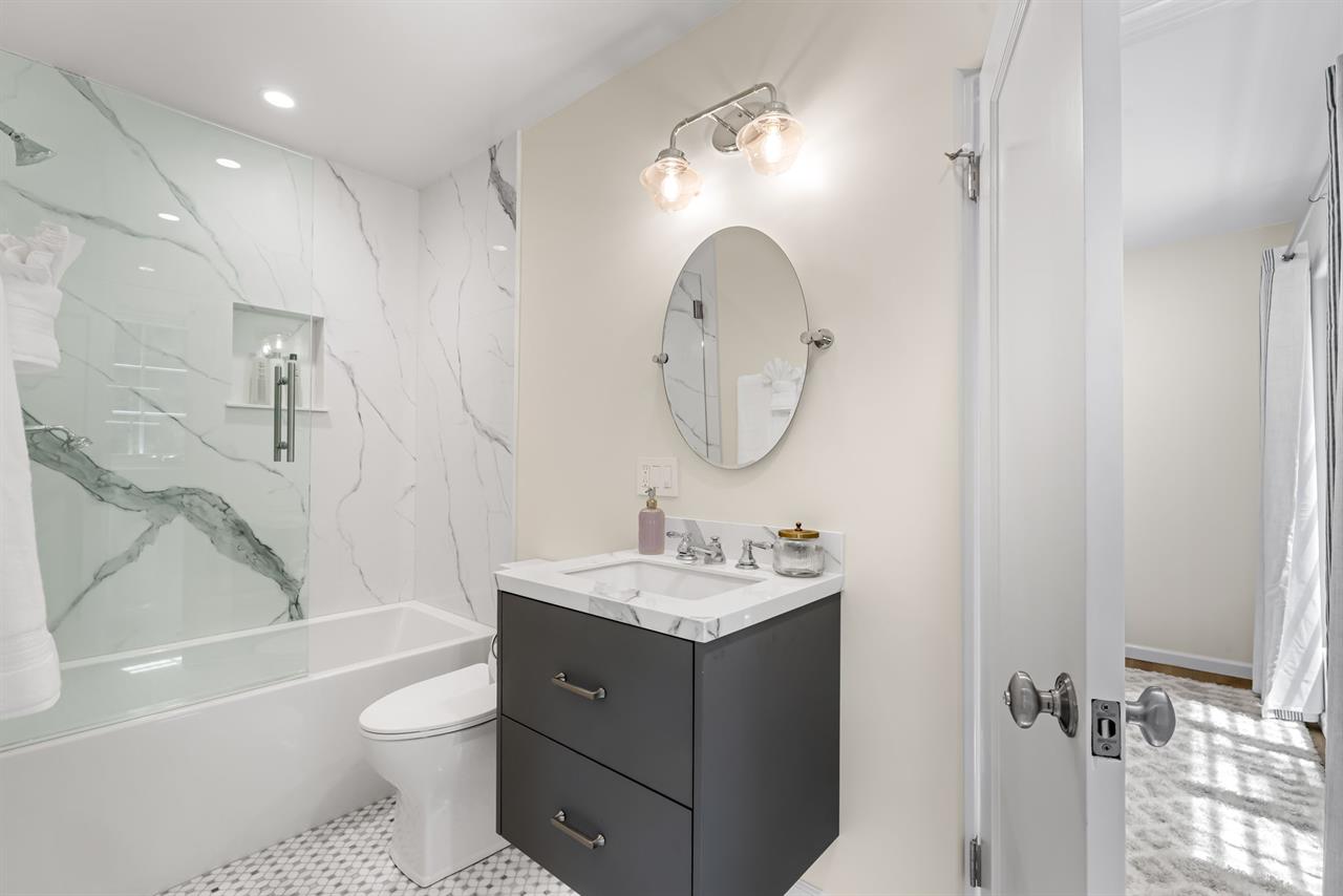 Jack and Jill Bathroom for Bedrooms 2 and 3  Downstairs