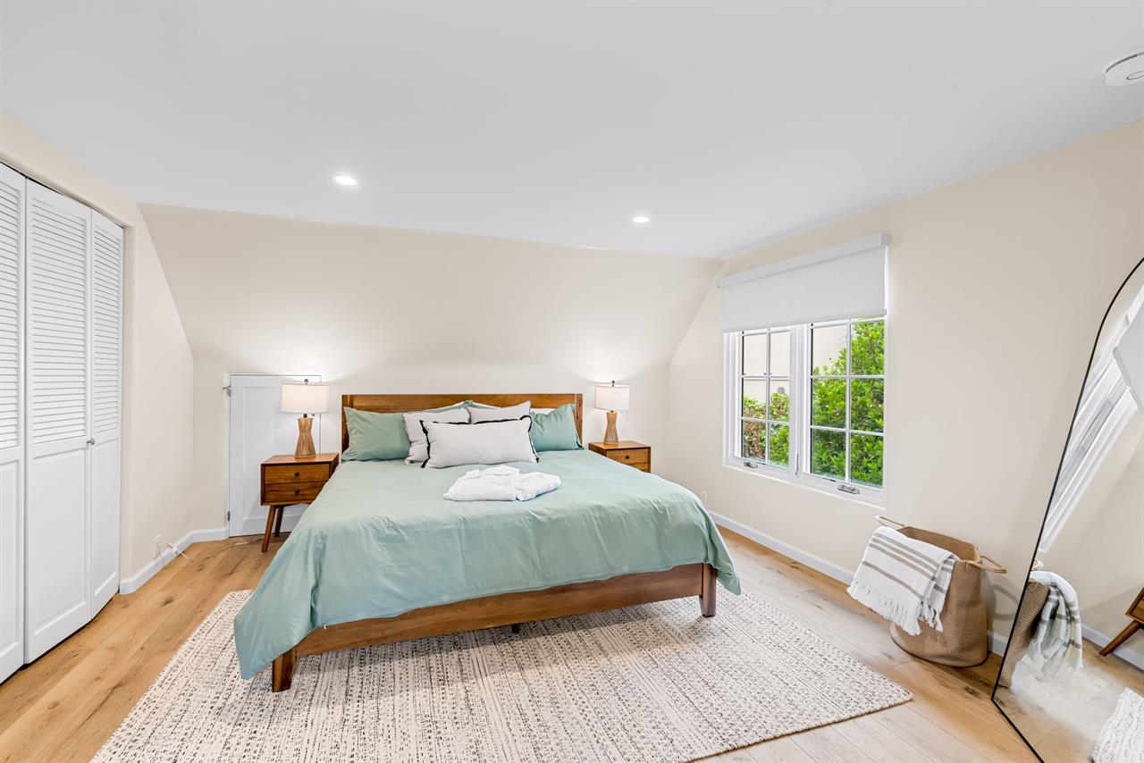 Bedroom 1 has a King Bed and EnSuite Bath with a Shower
