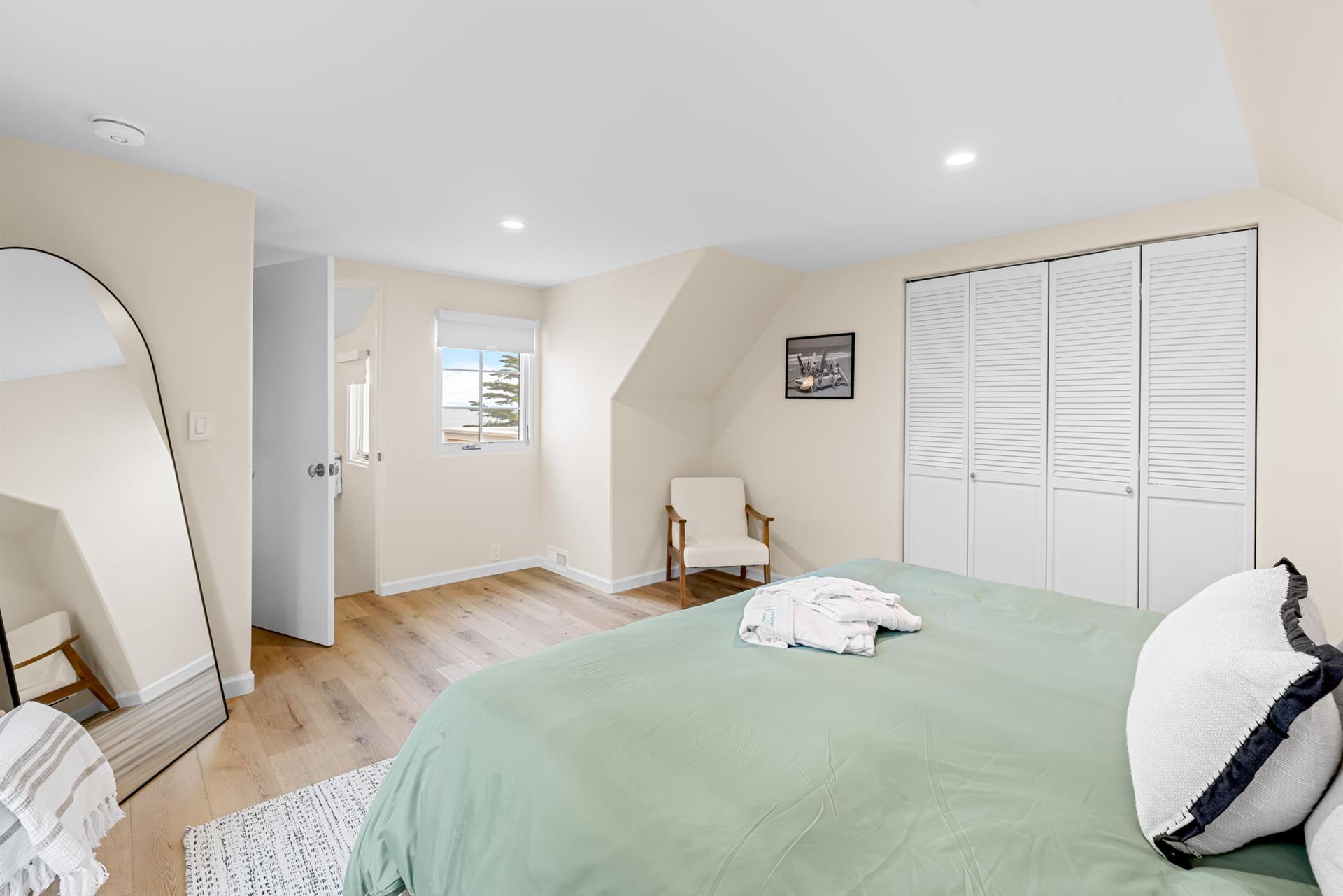 Bedroom 1 has a King Bed and EnSuite Bath with a Shower
