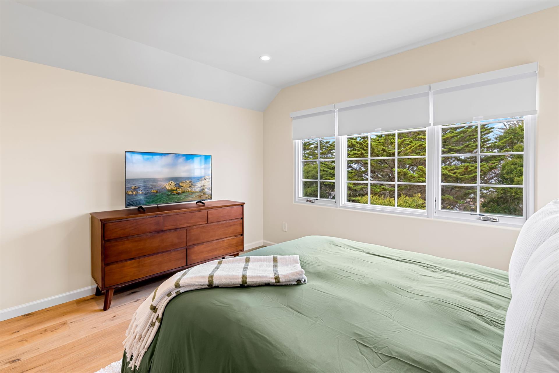 Bedroom 2 has a Queen Bed and EnSuite Bath with a Shower