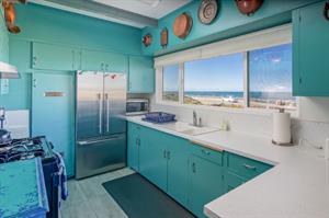 Fully Equipped Kitchen has an Ocean View Too