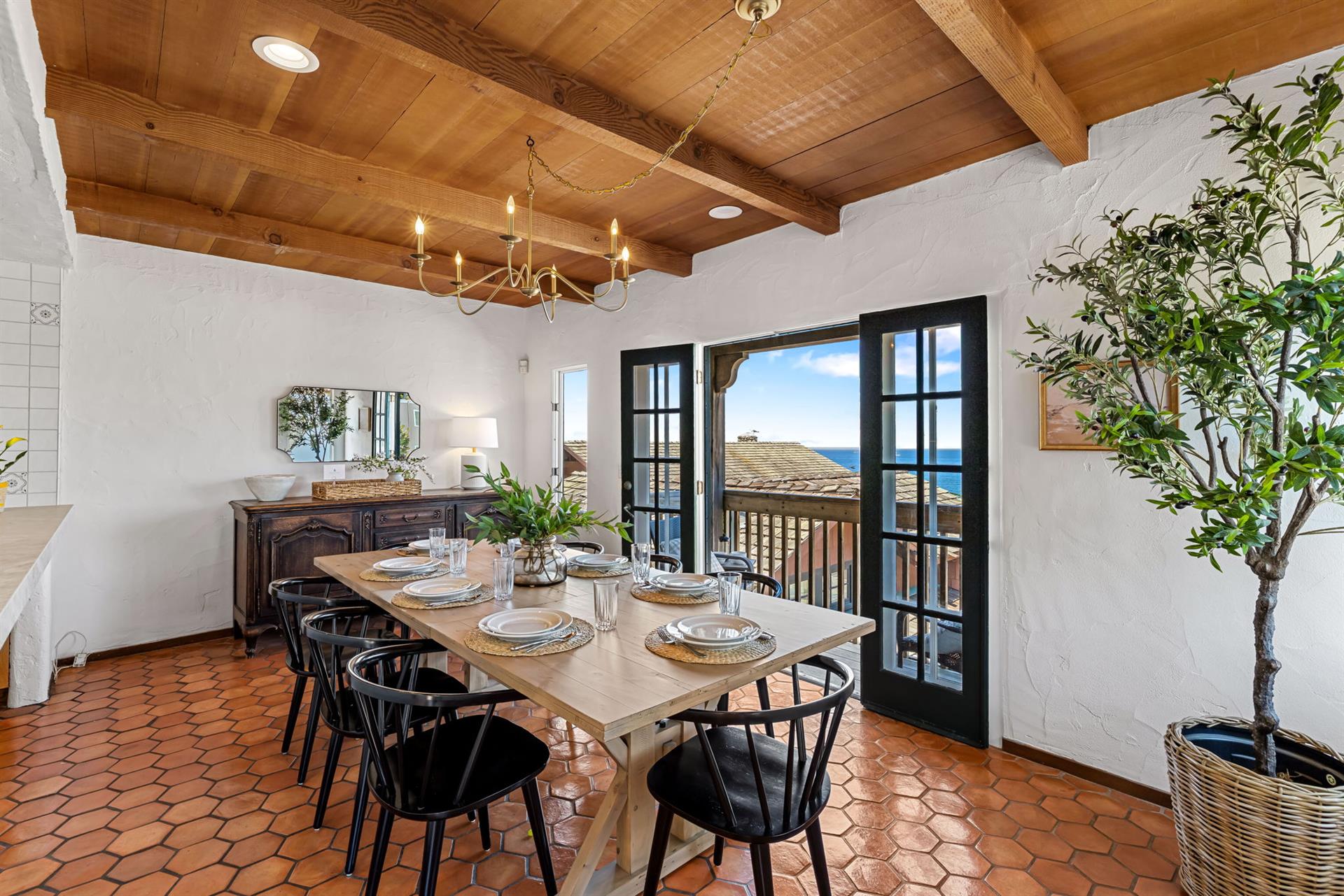 Dining Area Next to the Kitchen has a Stunning Bay View